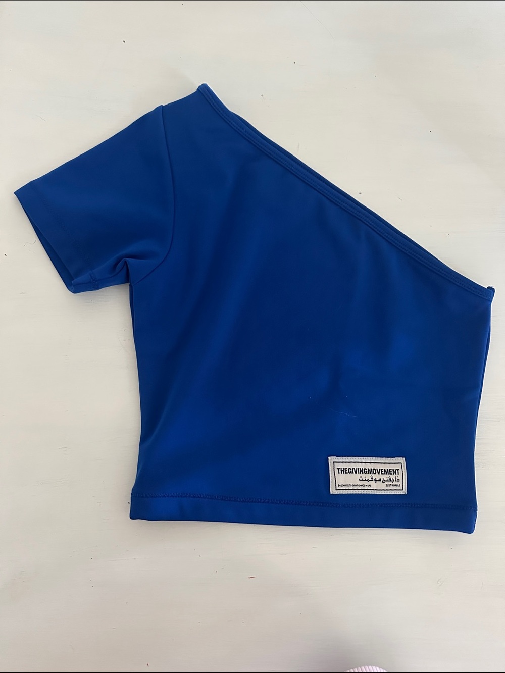 One-Shoulder Top in Royal Blue by TheGivingMovement